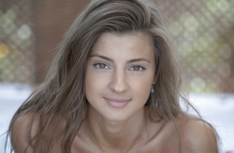 Beautiful solo girl Maria showing off tight curves and shaved cunt outdoors