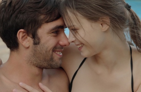 Alluring girlfriend in bikini Beatrice fucks her boyfriend & his buddy outdoors