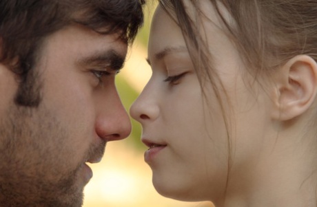 Alluring girlfriend in bikini Beatrice fucks her boyfriend & his buddy outdoors