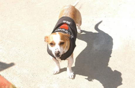 Blonde authentic Riley Evens smokes a cigarette during artistic modeling gig