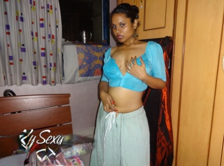 Indian solo girl Lily Singh exposes her natural breasts in a skirt