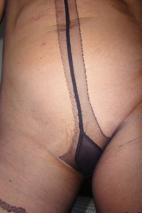 Happy alluring mature Deide Jones rips pantyhose to reveal butterfly femininity