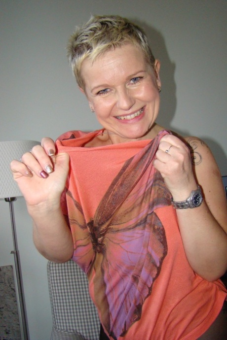 Happy alluring mature Deide Jones rips pantyhose to reveal butterfly femininity