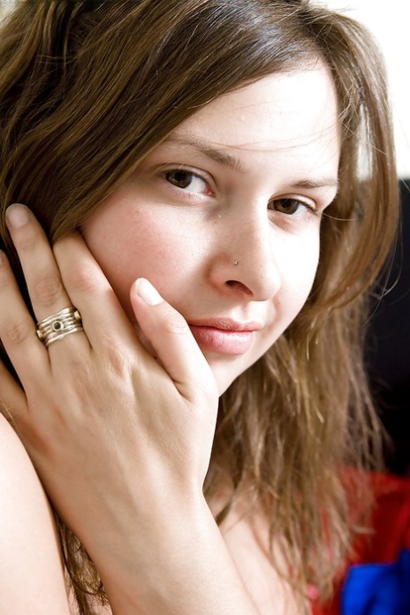 Buxom authentic Laurice removes clothing to display her BBW figure