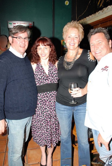 Mature lady Tracy Lick introduces her swinging friends at a party