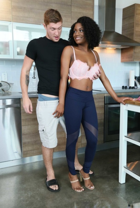 Afro-American girlfriend Evi Rei sucks a white prick & takes it from behind