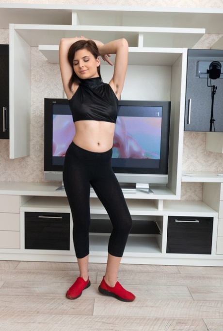 Little authentic MATURE WOMAN Zlata exposing her hairy crotch in front of the TV