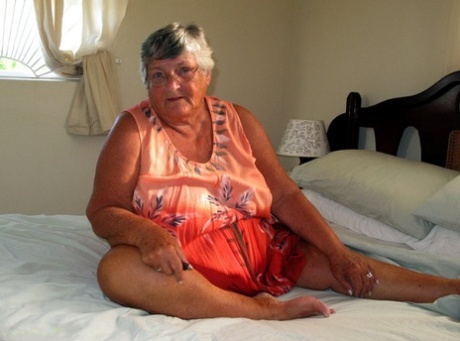 Fat old Grandma Libby licking her big nipples while spreading artistic for closeup