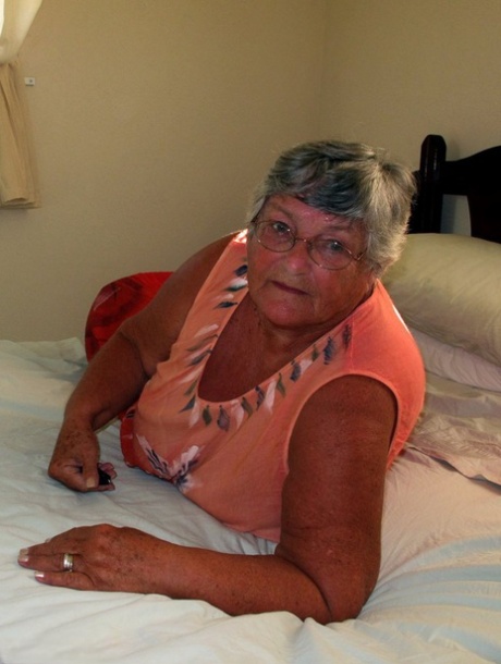 Fat old Grandma Libby licking her big nipples while spreading artistic for closeup