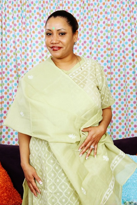 Older mature Indian Kira B modelling her alluring legs non artistic in sandals