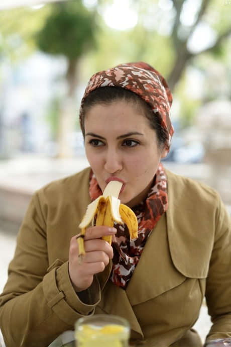 Cute authentic mom Lili flashes her muff as she poses pantyless in public