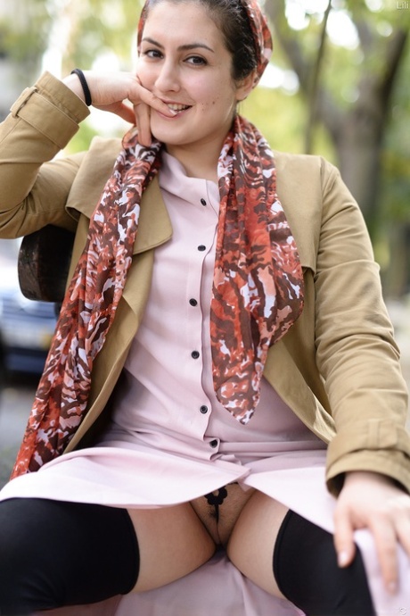 Cute authentic mom Lili flashes her muff as she poses pantyless in public