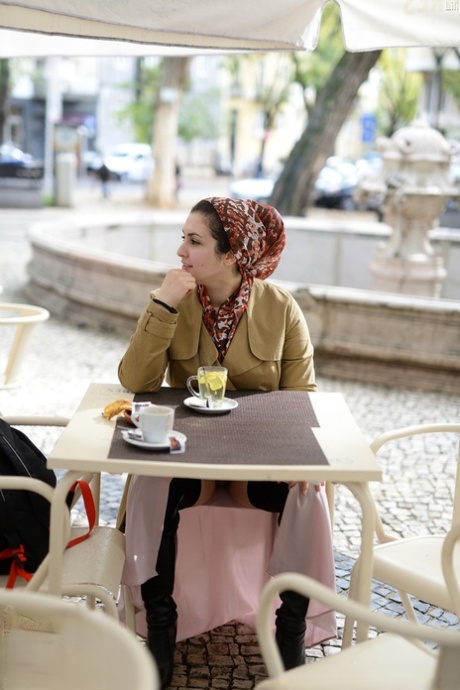 Cute authentic mom Lili flashes her muff as she poses pantyless in public