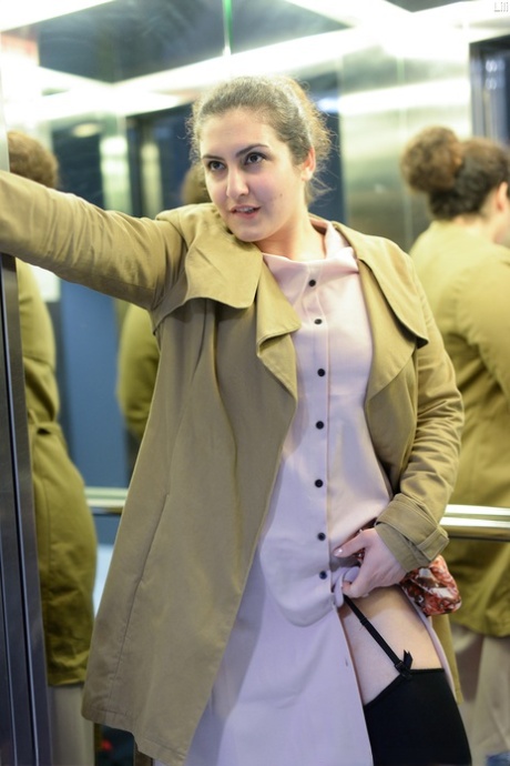 Cute authentic mom Lili flashes her muff as she poses pantyless in public