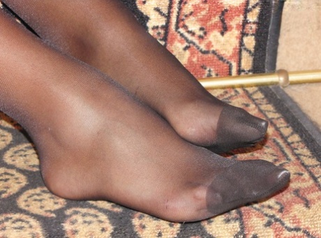Foot fetish loving girl Valentina wearing black pantyhose