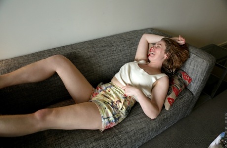 Australian housewife Molly Broad pets her femininity during artistic modeling premiere