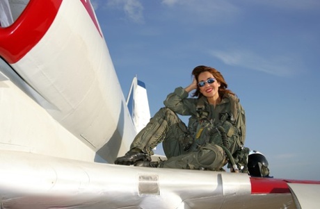 Sizzling mature babe Roni strips from military air force uniform