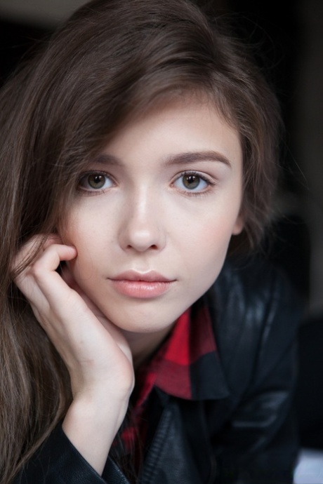 First timer releases her big breasts from sheer attire upon her bed