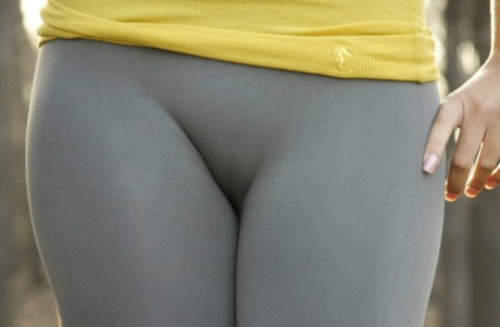 Authentic model Destiny Moody tales off her spandex pants in the woods