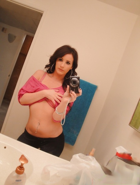 Barely legal young adult Mia Valentine taking natural mirror selfies while undressing