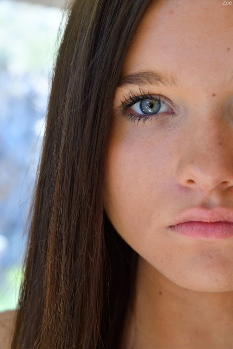 Alluring authentic young adult Zoe giving her horny femininity orgasmic strokes with dildos