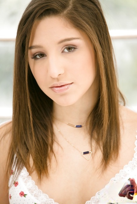 Young babe Abella Danger posing for artistic photos in knee high socks