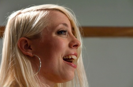 Busty blonde teacher Lorelei Lee trying out a sybian machine in the classroom