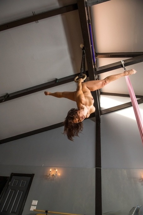 Fit MATURE WOMAN works up a sweat on rings before fucking a long manhood