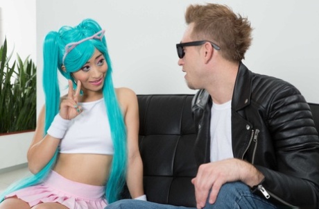 Asian cutie Ayumu Kase seduces a white boy in her cosplay outfit
