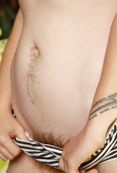 Ugly redhead woman Velma exposing her hirsute body outdoors