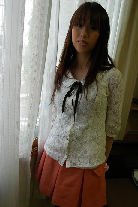 Smiley asian girl getting artistic and exposing hairy gash in close up