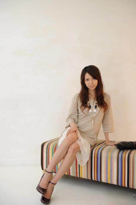 Japanese solo girl Rino Tokiwa models non artistic in skirt and ankle strap shoes