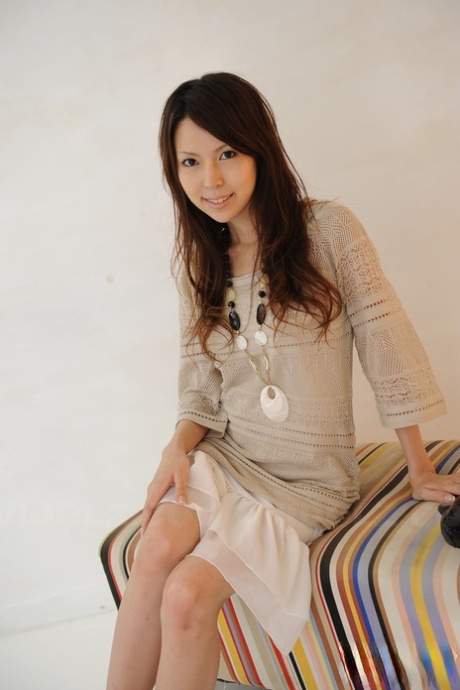 Japanese solo girl Rino Tokiwa models non artistic in skirt and ankle strap shoes