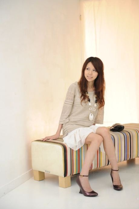 Japanese solo girl Rino Tokiwa models non artistic in skirt and ankle strap shoes