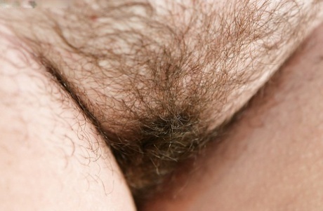 Chubby girl with freckles and big natural breasts spreads hairy cunt outside