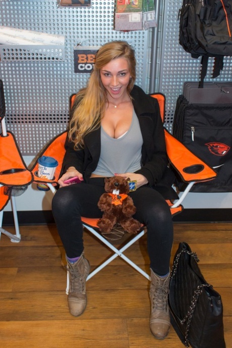 Young adult Kendra Sunderland shamelessly flashes her femininity and big breasts in public