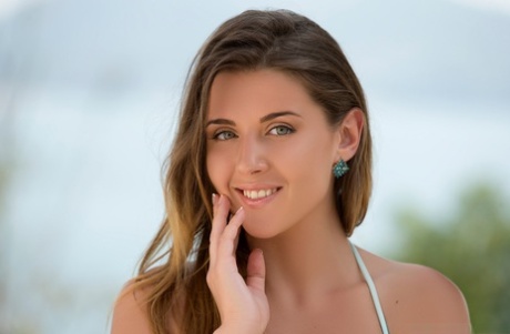 Wonderful playmate Kailena models in her bikini for some attractive photos