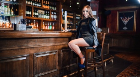 European pornstar Zoe Doll fucks a man right in an open for business bar