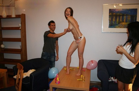 College students participate in explicit group intimacy during a birthday party