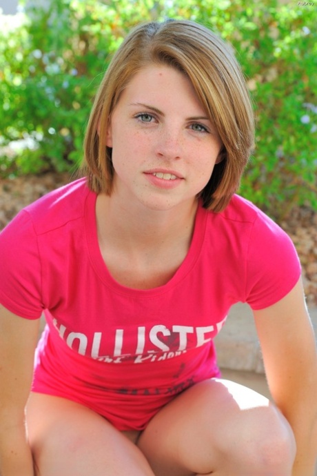 Sweet young adult Aubrey strips artistic and teases with her tiny breasts outdoors