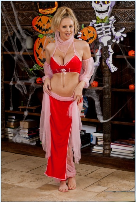 Alluring mom Julia Ann belly dancing and revealing her gorgeous breasts
