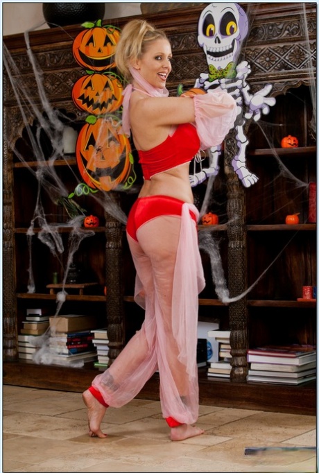 Alluring mom Julia Ann belly dancing and revealing her gorgeous breasts