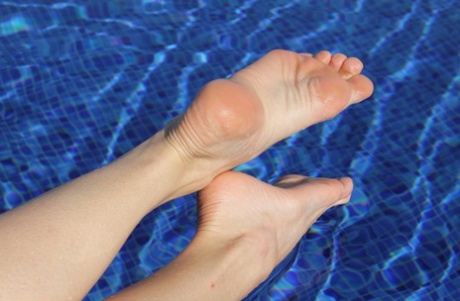 Four pairs of gorgeous adult content goddess feet in heels with attractive toe licking