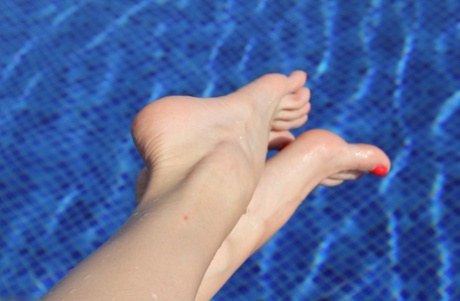 Four pairs of gorgeous adult content goddess feet in heels with attractive toe licking