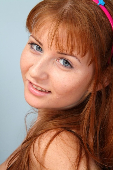 Cute Jess B showing her big breasts and spreading her hairy femininity in knee socks