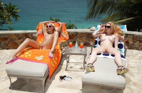 Pretty young adult babes in bikinis stripping and playing with their toys