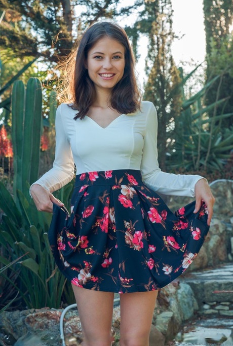 Cute solo girl Hilary C takes off her up skirt panties to pose in the artistic