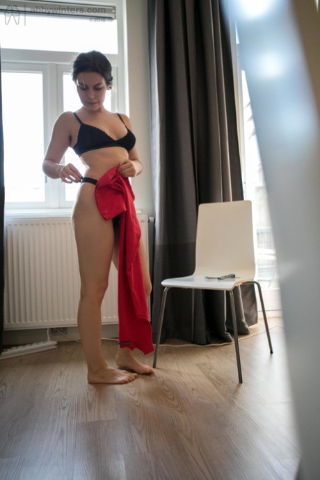 Alluring Daniela D showing off her super hairy vagina and perky breasts