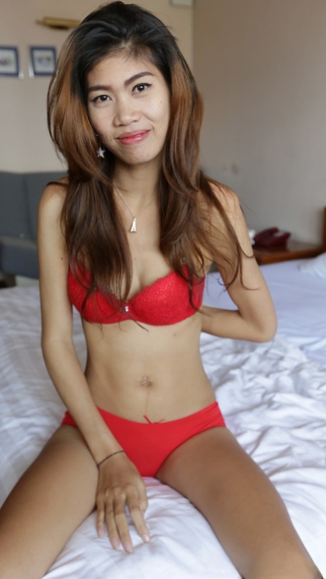 Asian babe Nam C shows off her petite body while stripping for some POV intimacy