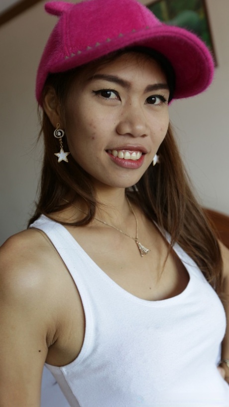 Asian babe Nam C shows off her petite body while stripping for some POV intimacy